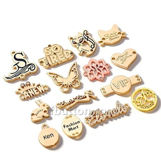 Fém logócímkék kézitáskákhoz